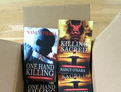 Win a Free Edition of One Hand Killing or Killing Sacred!